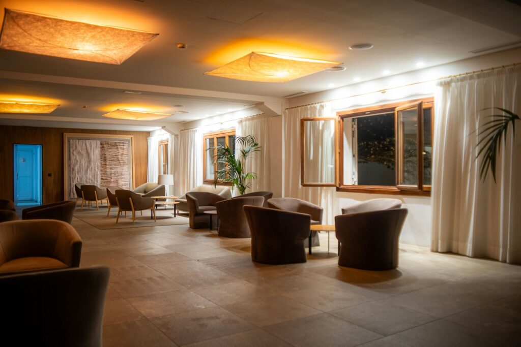 A room with a lot of chairs and lights